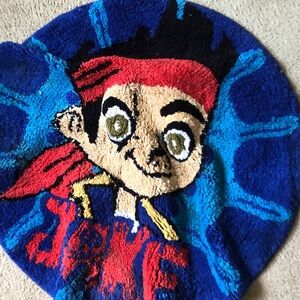 Round Cartoon Character Accent Rug in Blue, Red, Green